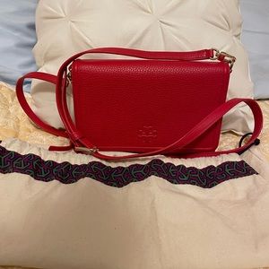 Tory Burch Crossbody bag or clutch.